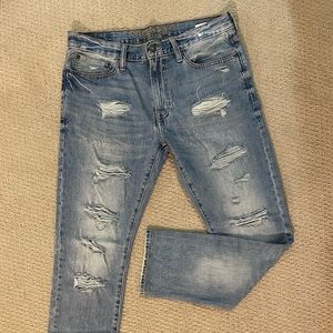 American Eagle distressed slim fit denim jeans with zipper fly. Size 32x30